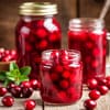 Банки компота брусничного